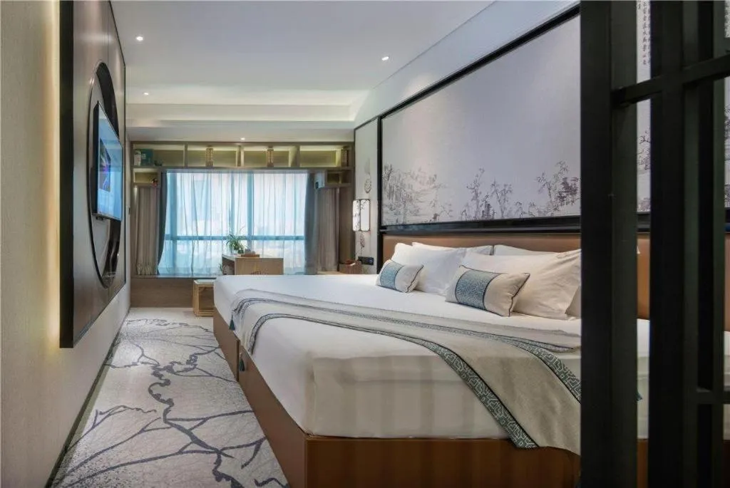 Bed in Yuan Culture Hotel Shenzhen World Shajing