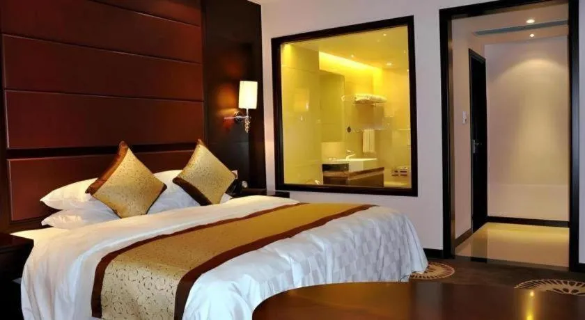 Bed in Hotel Ramada Plaza Hangzhou Xiaoshan