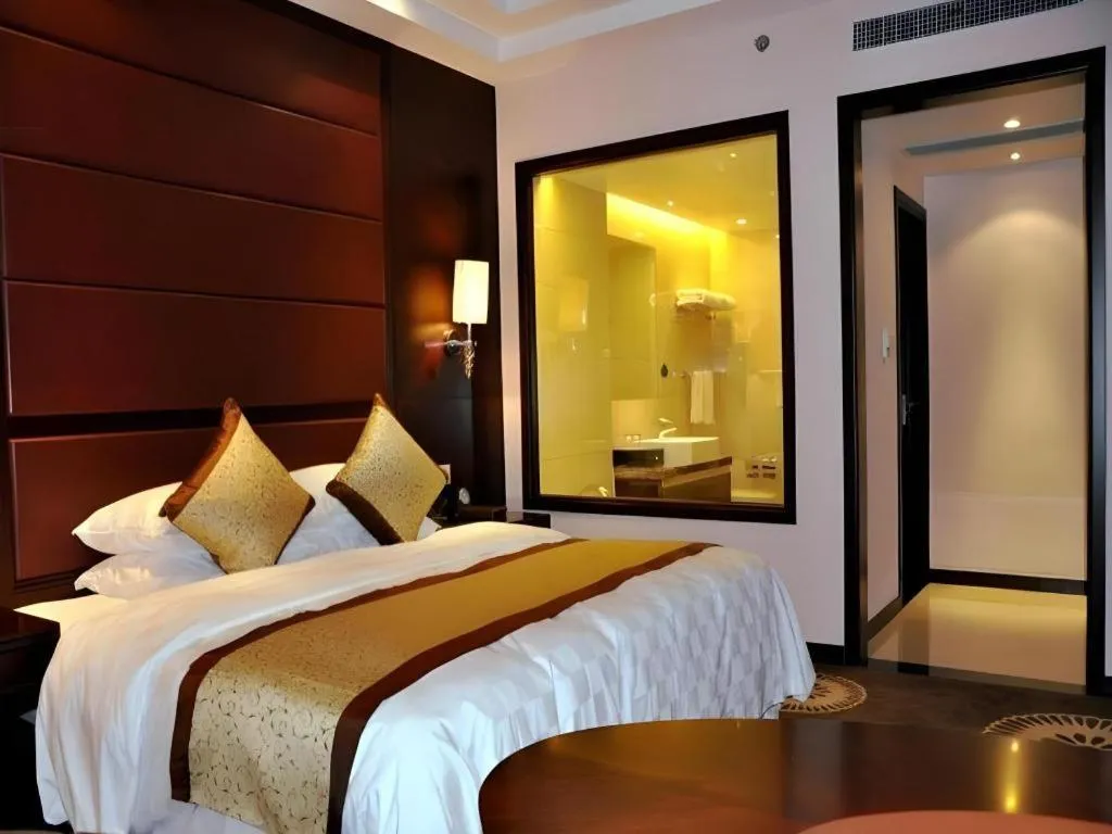 Bed in Hotel Ramada Plaza Hangzhou Xiaoshan