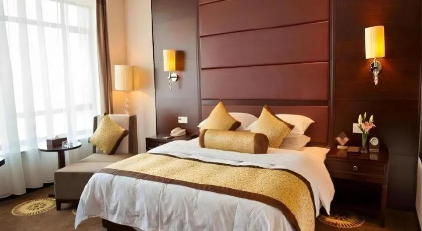 Bed in Hotel Ramada Plaza Hangzhou Xiaoshan
