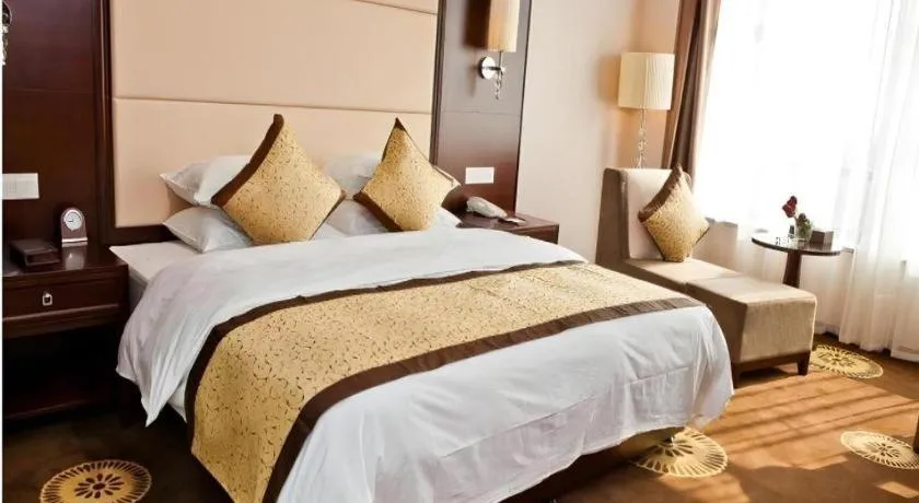 Bed in Hotel Ramada Plaza Hangzhou Xiaoshan