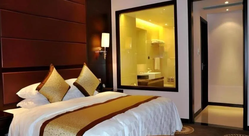 Bed in Hotel Ramada Plaza Hangzhou Xiaoshan