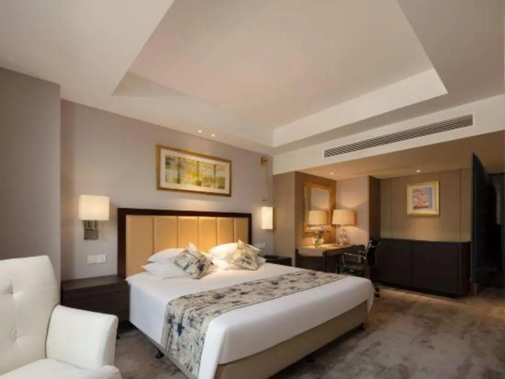 Bed in New Century Shaoxing Grand Hotel