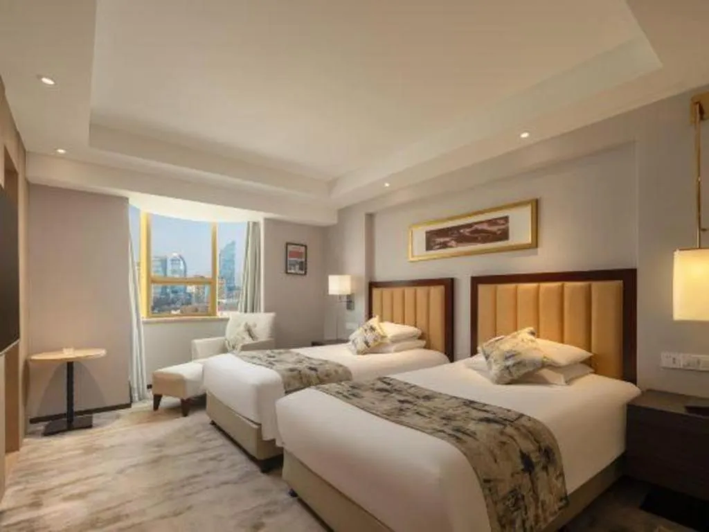 Bed in New Century Shaoxing Grand Hotel