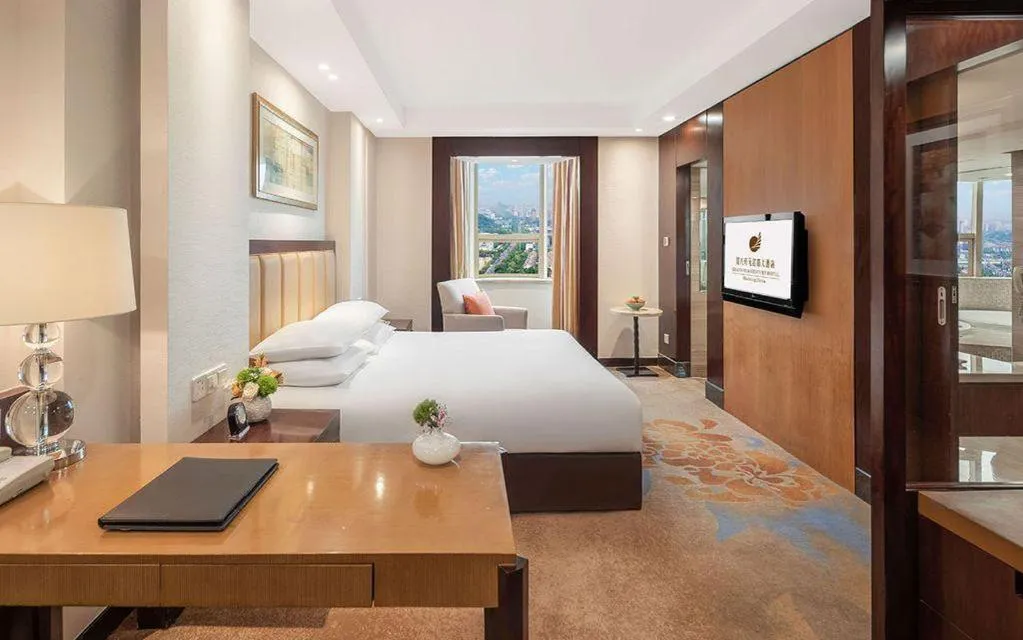 Bed in New Century Shaoxing Grand Hotel