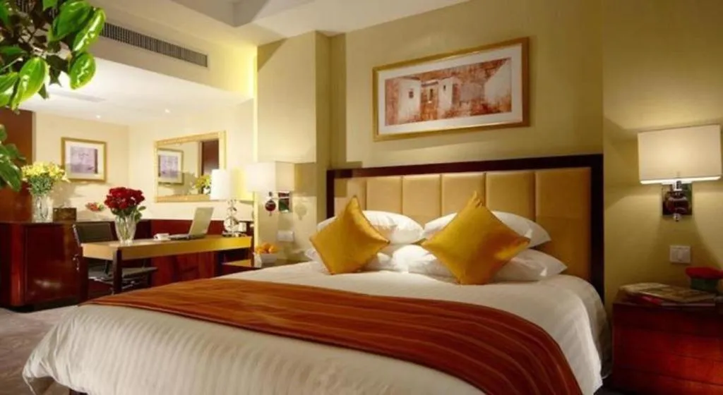 Bed in New Century Shaoxing Grand Hotel