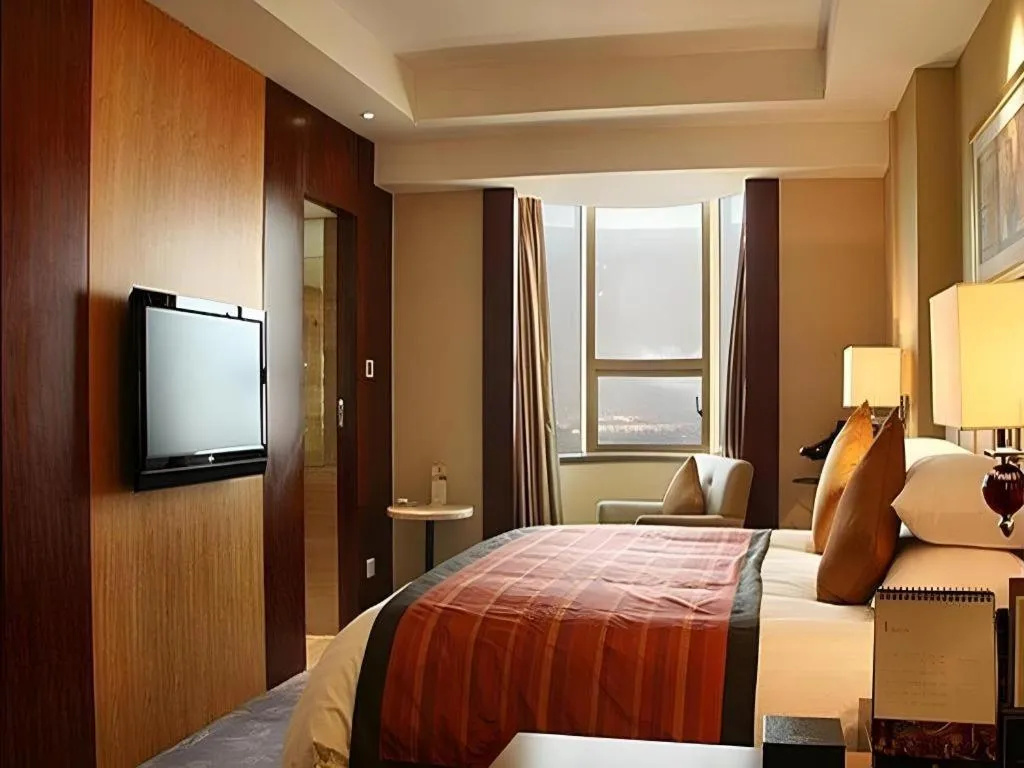 Bed in New Century Shaoxing Grand Hotel
