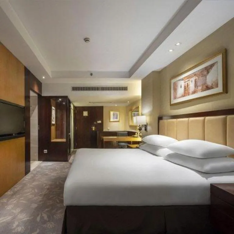 Bed in New Century Shaoxing Grand Hotel