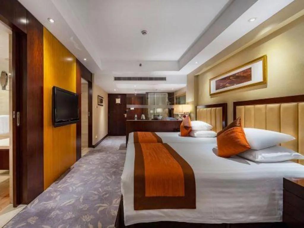 Bed in New Century Shaoxing Grand Hotel