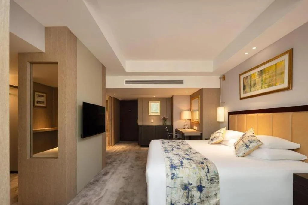 Bed in New Century Shaoxing Grand Hotel