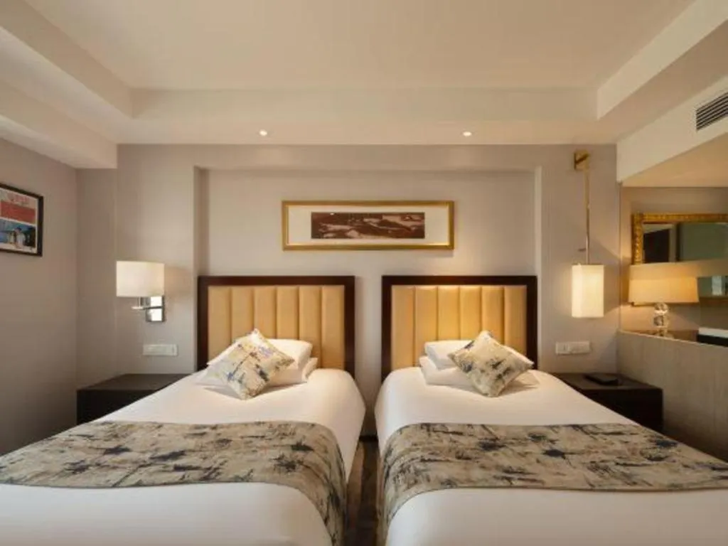 Bed in New Century Shaoxing Grand Hotel