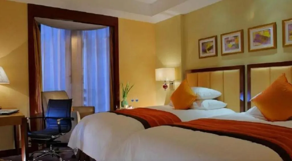 Bed in New Century Shaoxing Grand Hotel