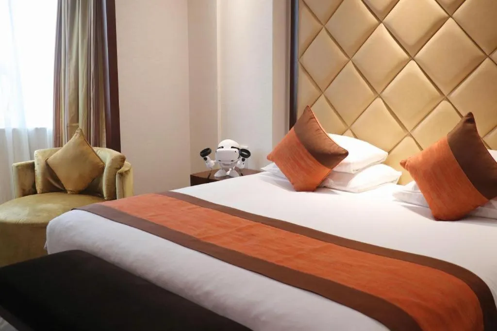 Bed in New Century Shaoxing Grand Hotel