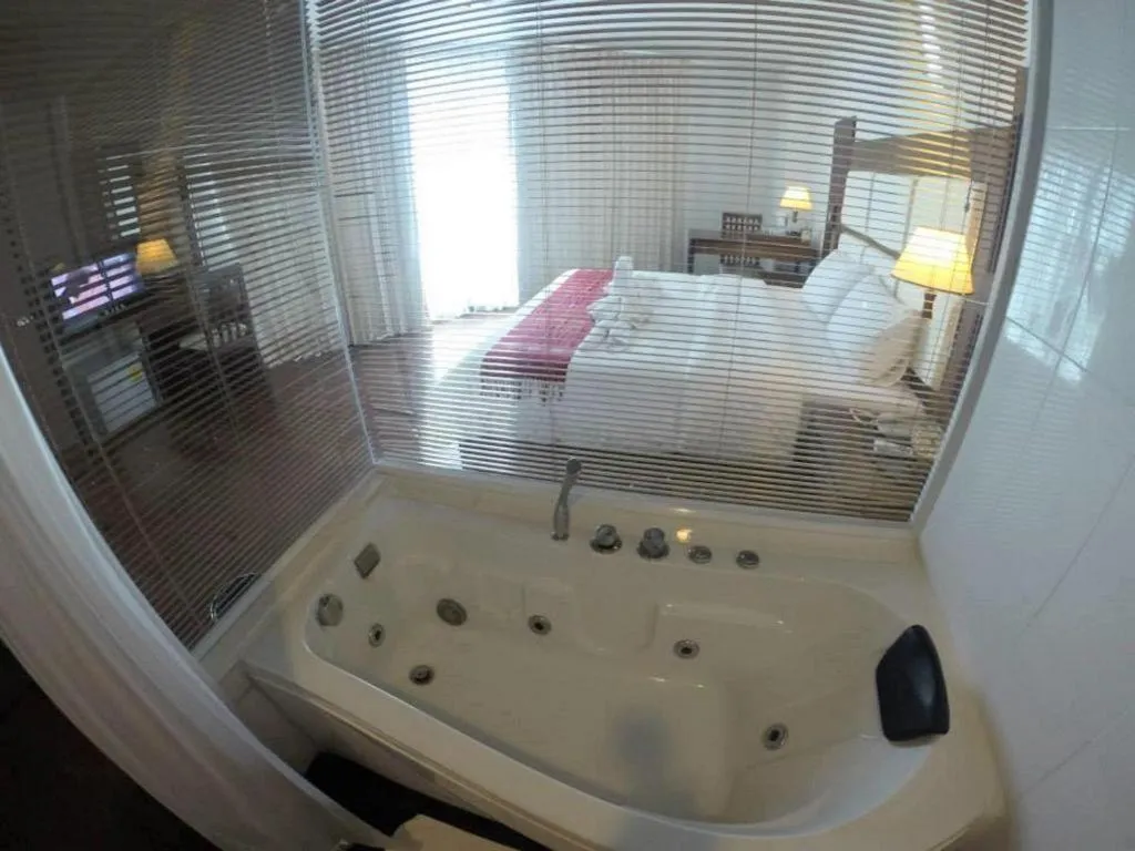 Bed in River City Hotel