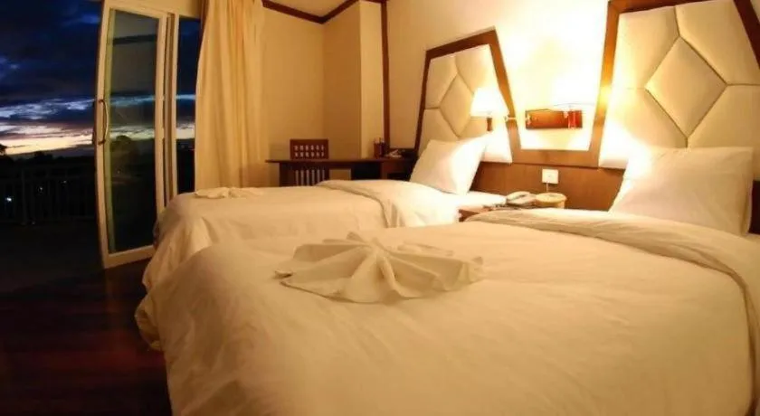 Bed in River City Hotel