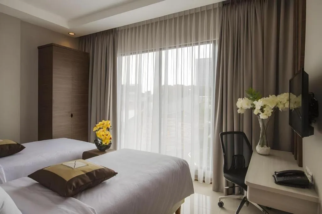 Bed in Sawana Suites