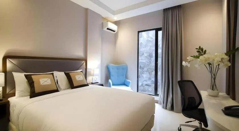 Bed in Sawana Suites