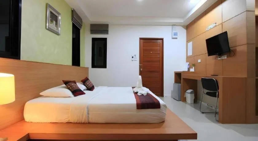 Bed in Phakawan Hotel