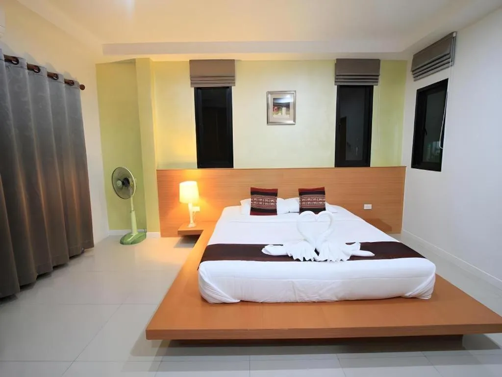 Bed in Phakawan Hotel