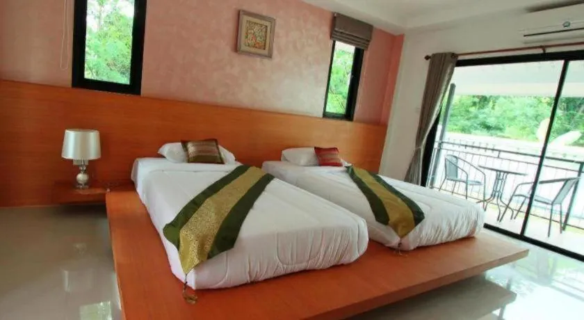 Bed in Phakawan Hotel