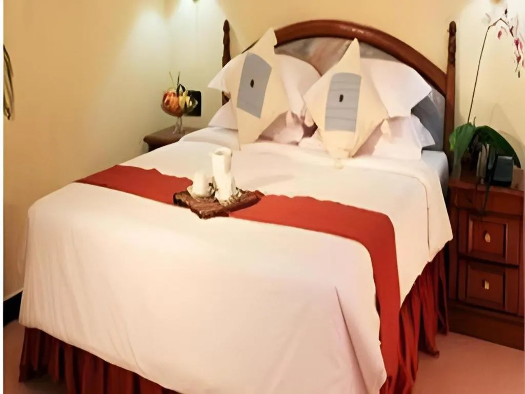 Bed in Sahid Kawanua Hotel