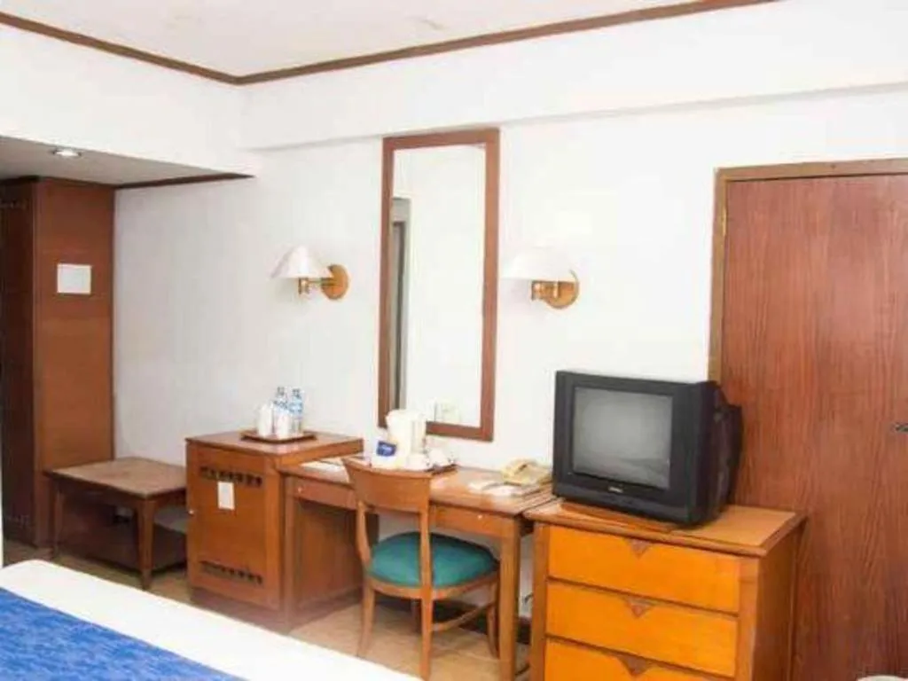 Bed in Sahid Kawanua Hotel