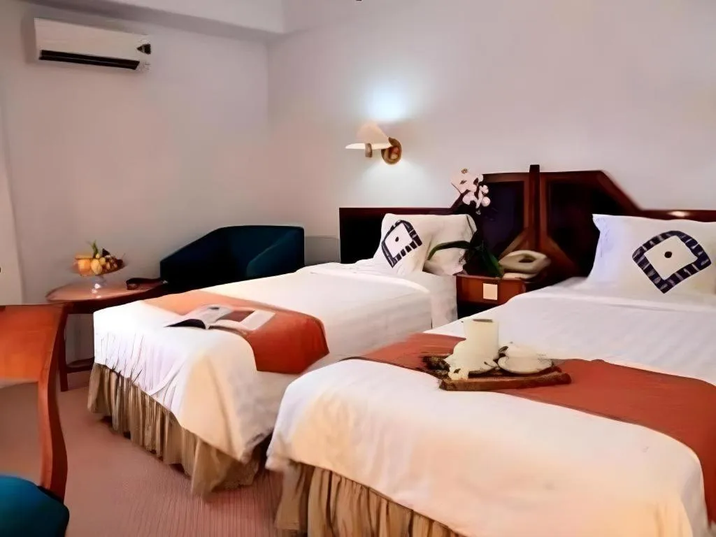 Bed in Sahid Kawanua Hotel