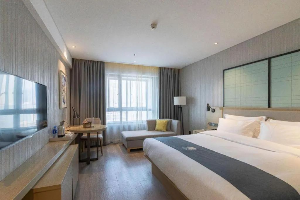 Bed in Echarm Hotel Nanchang Hongcheng Wangfujing