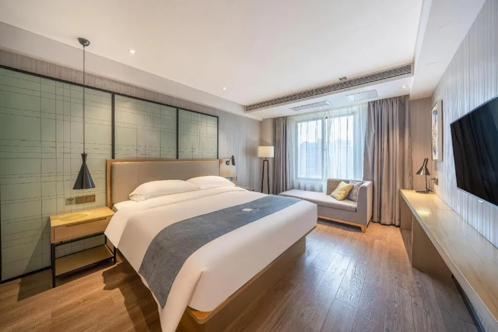 Bed in Echarm Hotel Nanchang Hongcheng Wangfujing