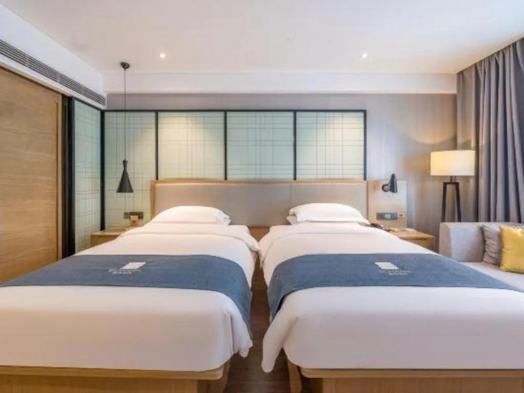 Bed in Echarm Hotel Nanchang Hongcheng Wangfujing