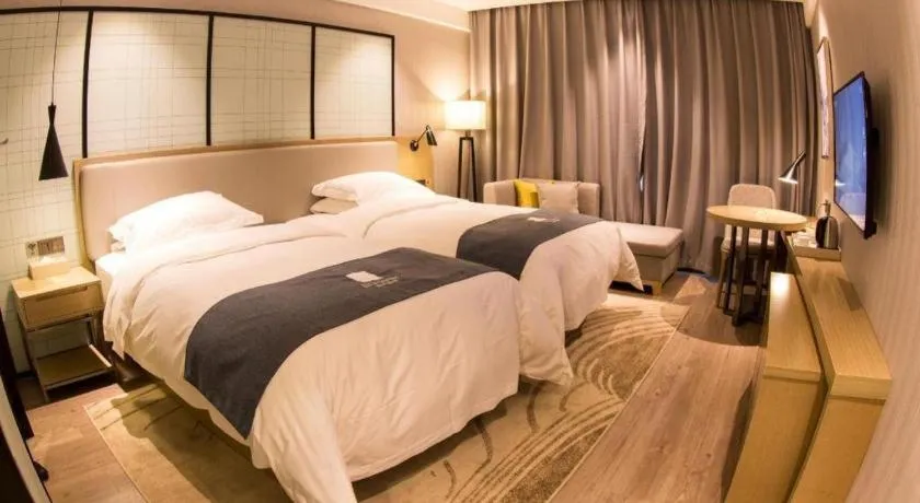 Bed in Echarm Hotel Nanchang Hongcheng Wangfujing