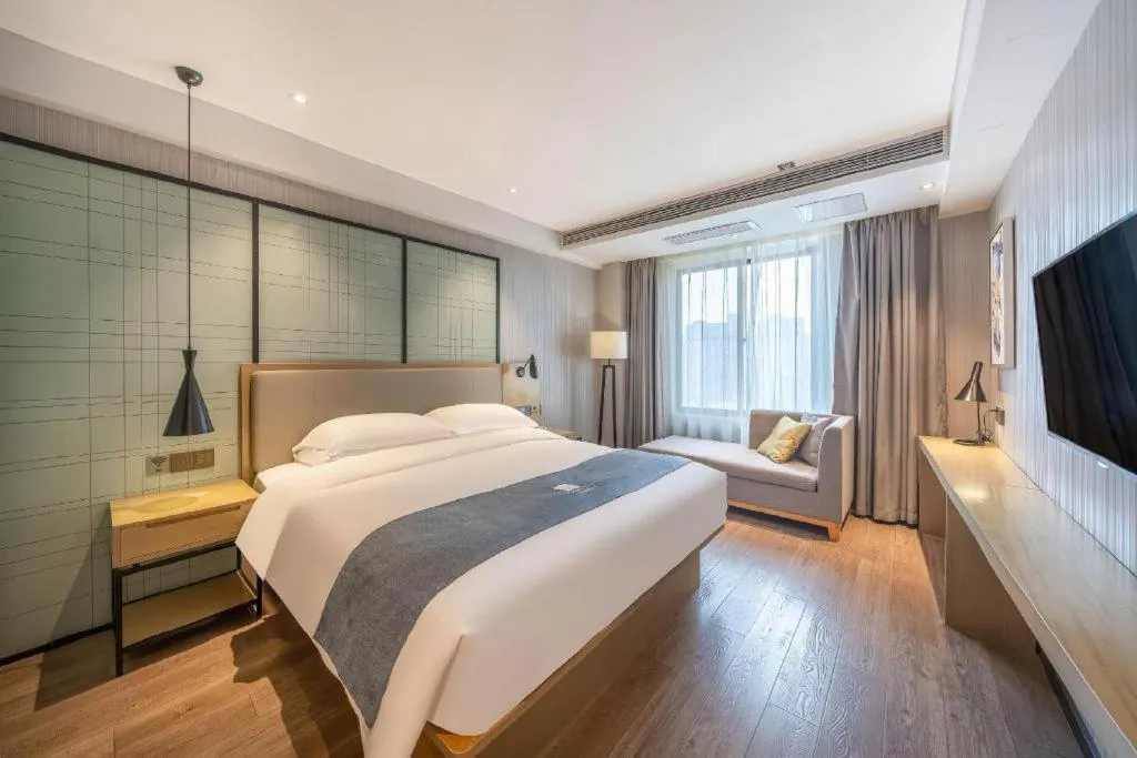 Bed in Echarm Hotel Nanchang Hongcheng Wangfujing