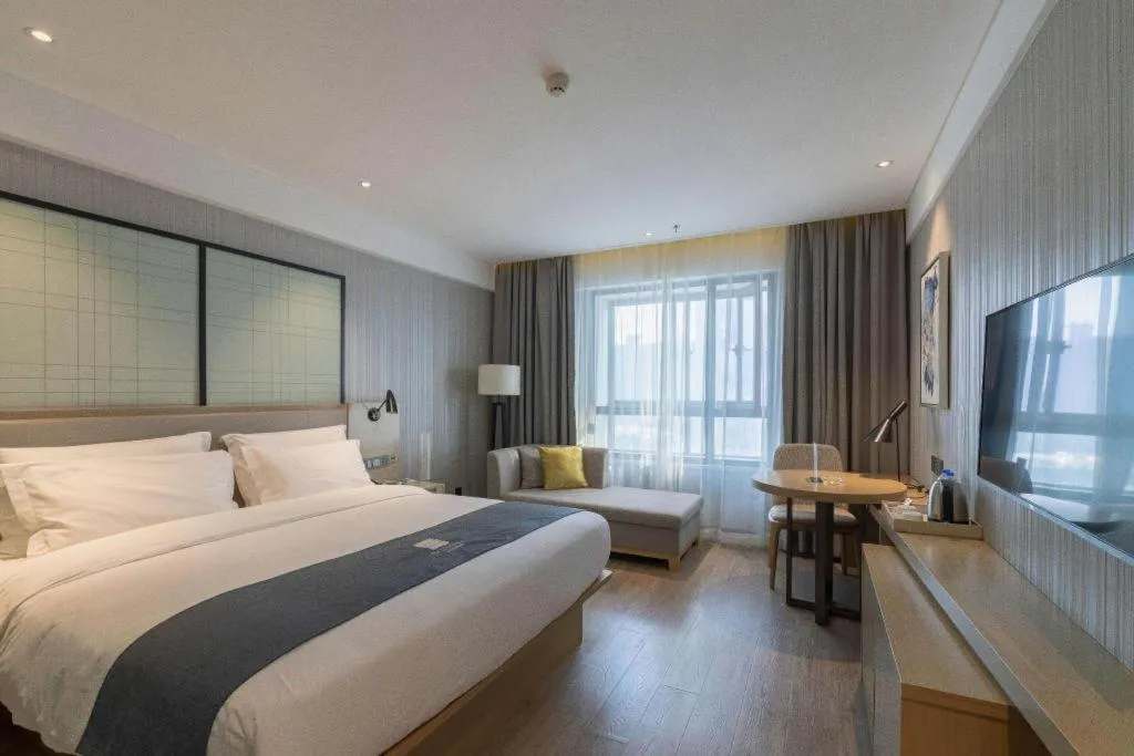 Bed in Echarm Hotel Nanchang Hongcheng Wangfujing