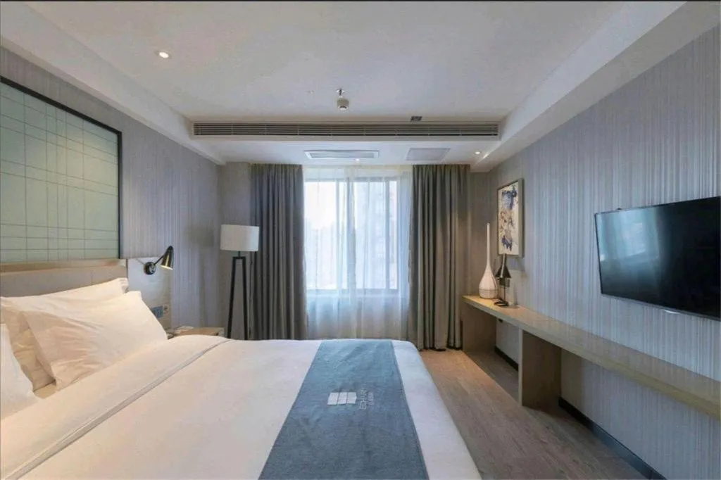 Bed in Echarm Hotel Nanchang Hongcheng Wangfujing