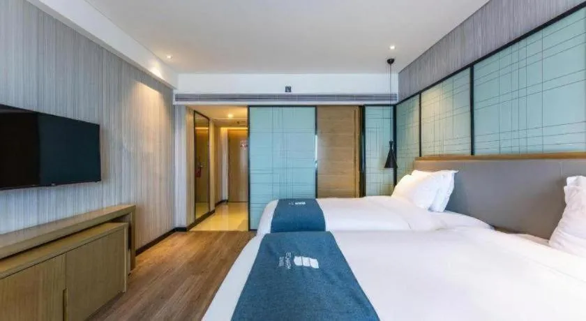 Bed in Echarm Hotel Nanchang Hongcheng Wangfujing