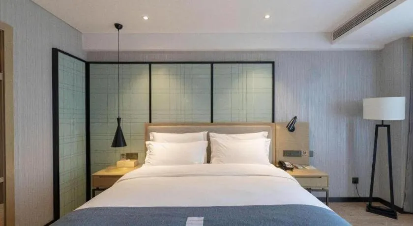 Bed in Echarm Hotel Nanchang Hongcheng Wangfujing