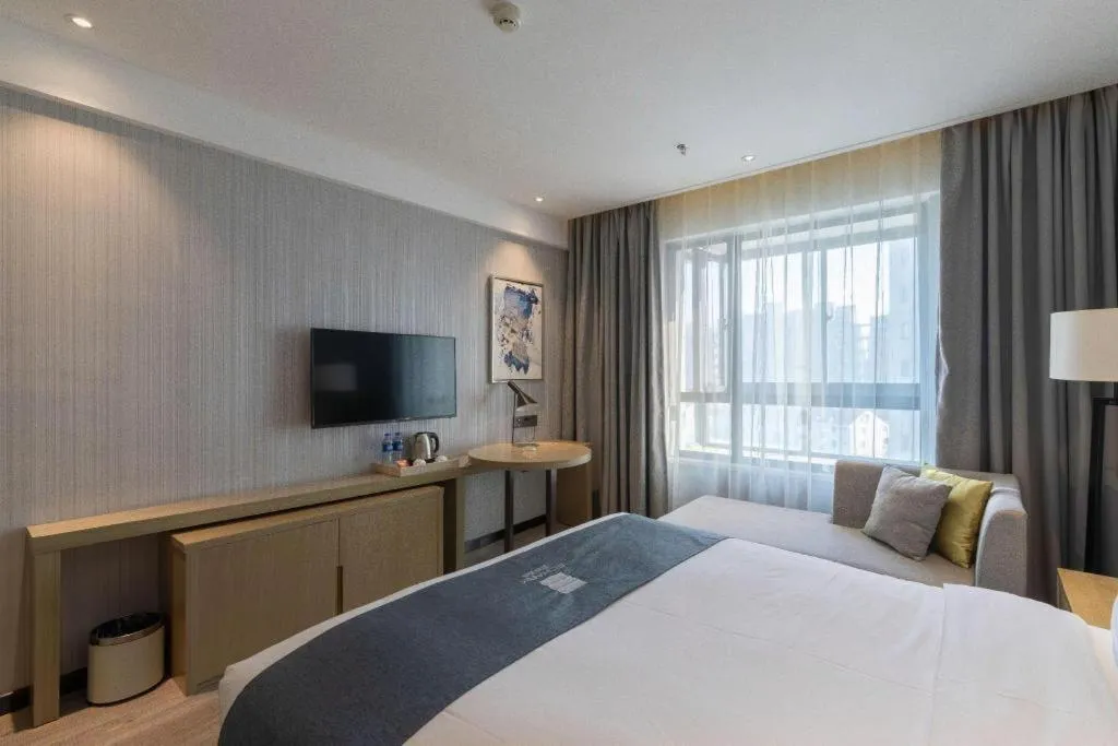 Bed in Echarm Hotel Nanchang Hongcheng Wangfujing