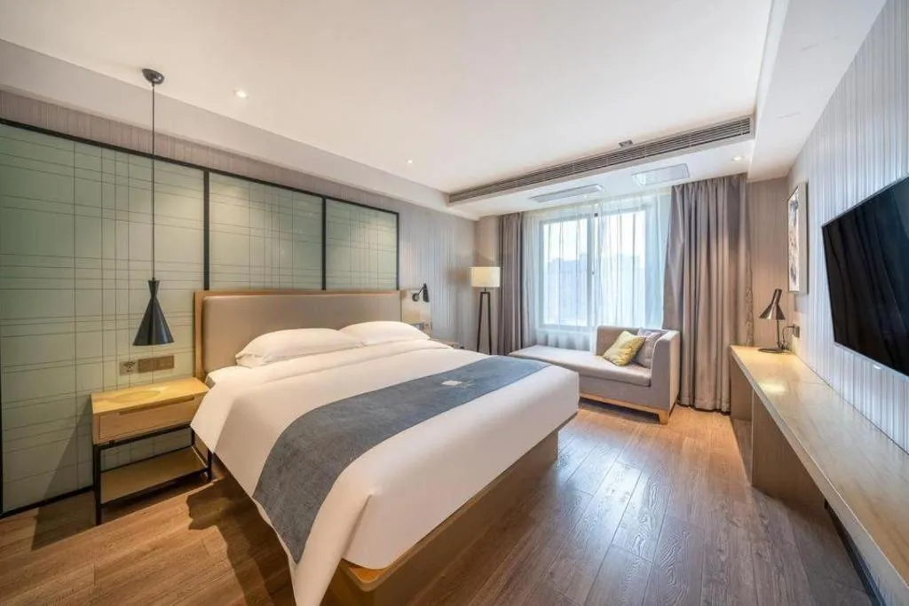 Bed in Echarm Hotel Nanchang Hongcheng Wangfujing