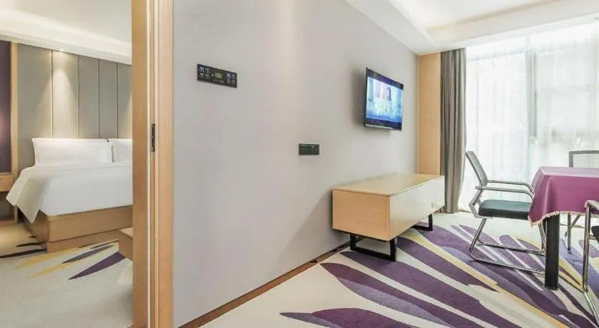 Bed in Lavande Hotel·Xishuangbanna Jinghong Songkran Square