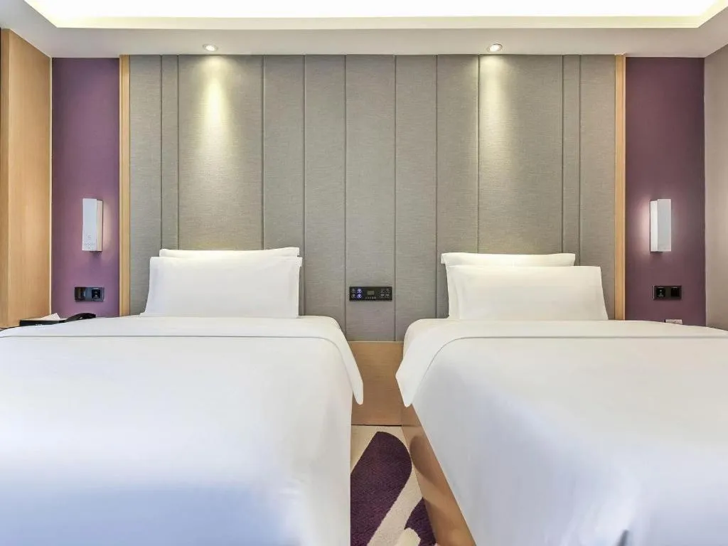 Bed in Lavande Hotel·Xishuangbanna Jinghong Songkran Square