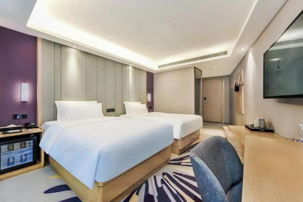 Bed in Lavande Hotel·Xishuangbanna Jinghong Songkran Square