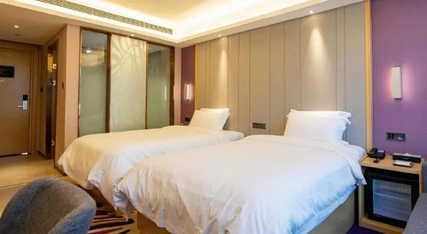 Bed in Lavande Hotel·Xishuangbanna Jinghong Songkran Square