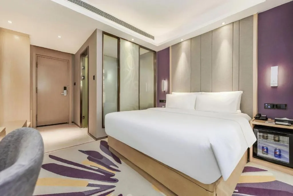 Bed in Lavande Hotel·Xishuangbanna Jinghong Songkran Square