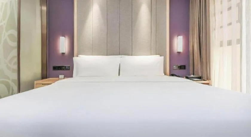 Bed in Lavande Hotel·Xishuangbanna Jinghong Songkran Square