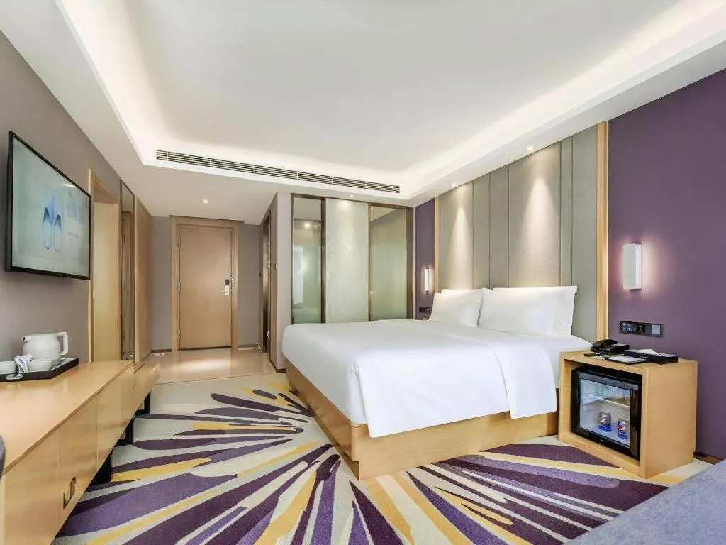 Bed in Lavande Hotel·Xishuangbanna Jinghong Songkran Square