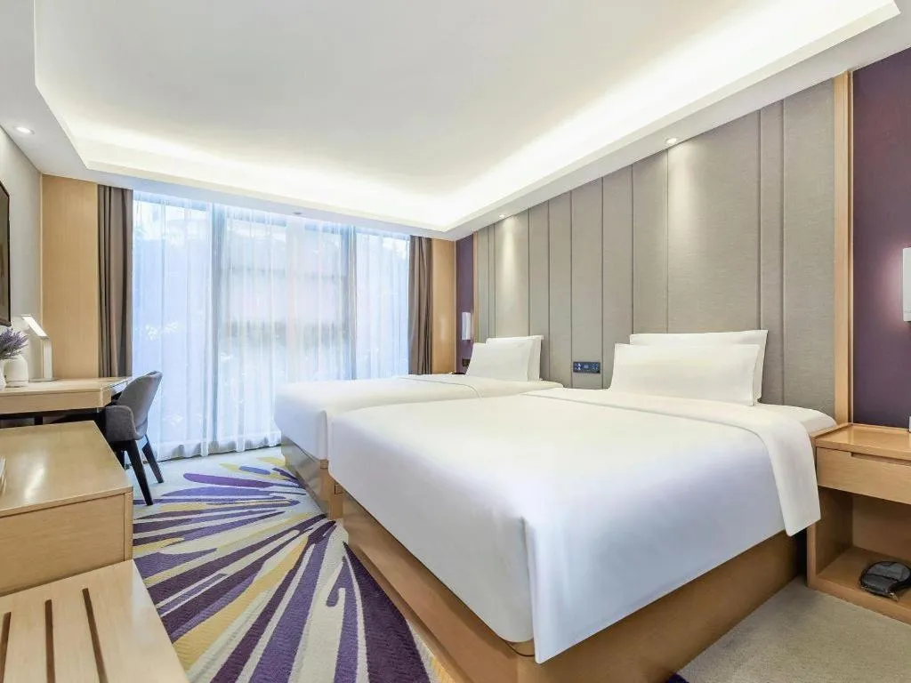 Bed in Lavande Hotel·Xishuangbanna Jinghong Songkran Square