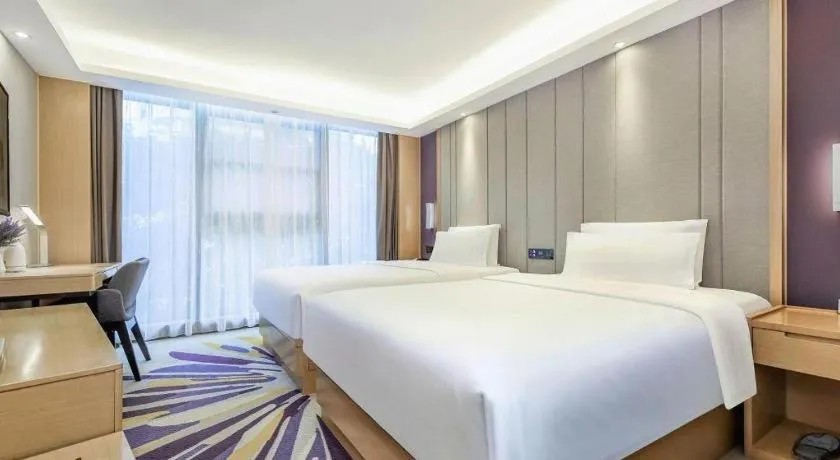 Bed in Lavande Hotel·Xishuangbanna Jinghong Songkran Square