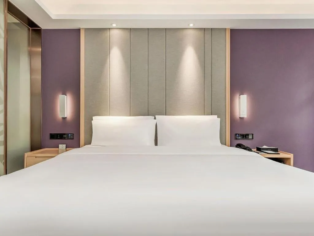 Bed in Lavande Hotel·Xishuangbanna Jinghong Songkran Square