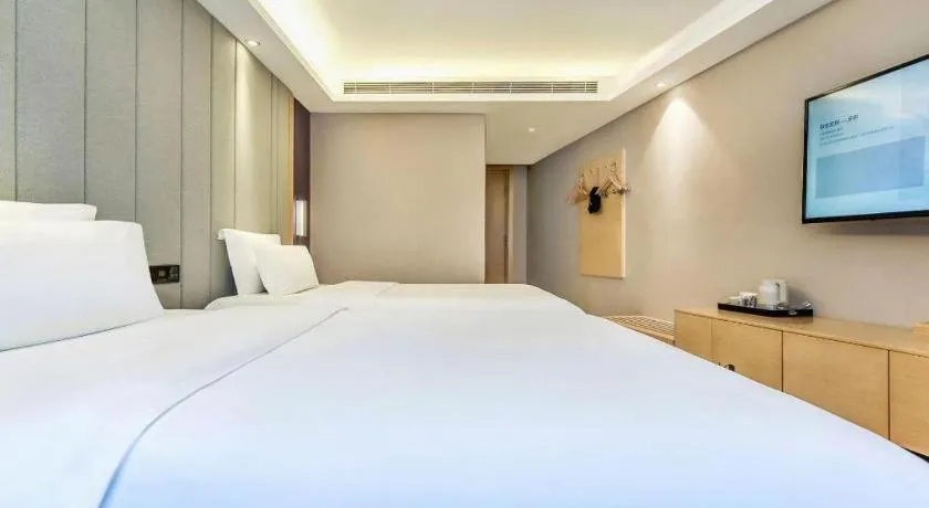 Bed in Lavande Hotel·Xishuangbanna Jinghong Songkran Square