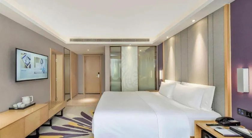 Bed in Lavande Hotel·Xishuangbanna Jinghong Songkran Square